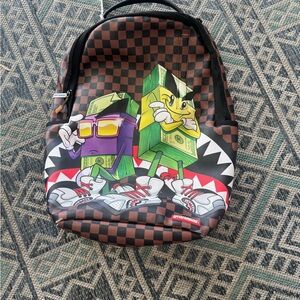 Sprayground Brown Checkered Backpack with Cartoon Design